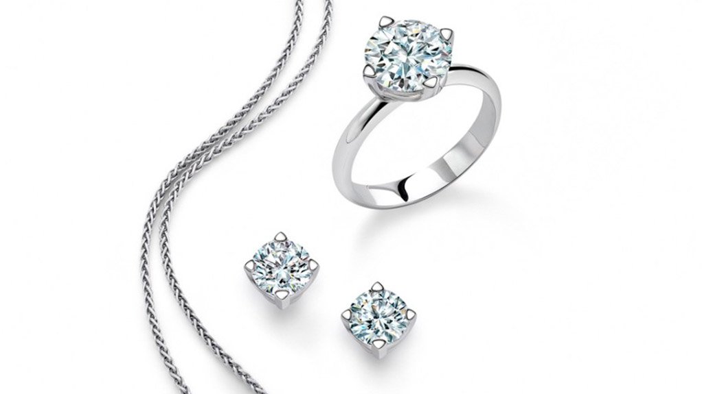 A necklace, diamond ring and earrings