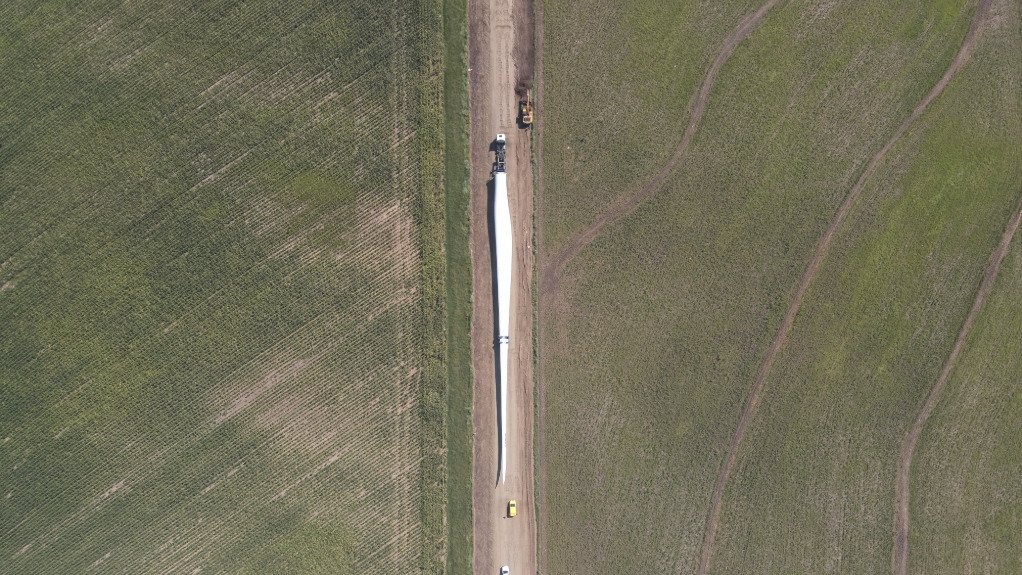 wind turbines being transported by truck