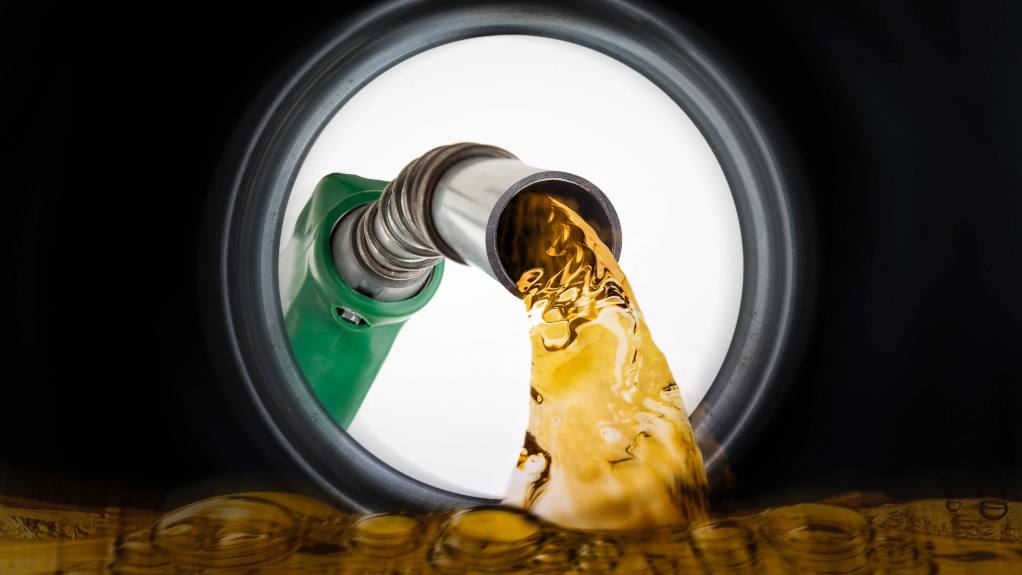 Image of diesel being poured from a fuel pump