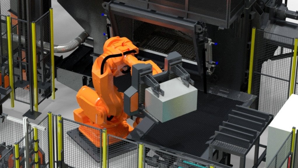 An image of a robot loading an engine block into the RMBS 1-6-400-30 blast system