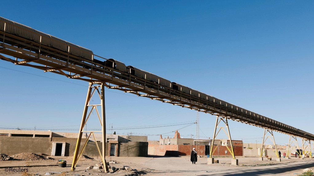 A conveyor transporting phosphate