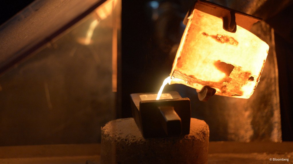 A gold bar being poured