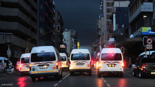 Vehicles driving on roads with traffic lights affected by loadshedding