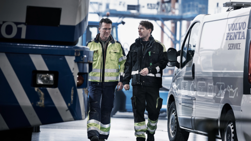 An image of Volvo Penta servicemen inside a workshop