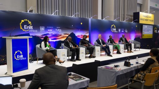 A panel of men and woman on a lit stage at last year's Enlit discussing the topics at hand 