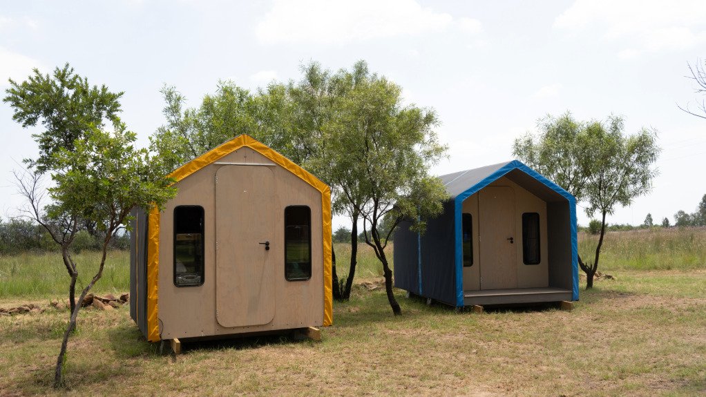 The above image depicts a large scale prototype of two houses
