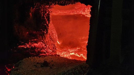 The opening of a firey furnance. 