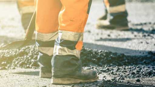 Construction workers' feet