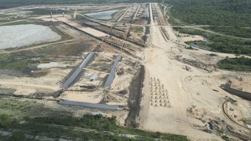 TAILINGS CONSTRUCTION
The TSF-4, looking north from TSF-3 and showing the main drain one and two being intercepted by the two penstock pipelines running southeast from penstock towers

