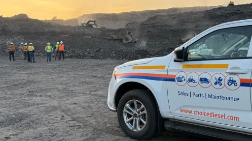A Choice Diesel vehicle on a mining site in Mozambique with workers near by. 
