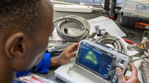 Image of a technician using a Booyco Electronics’ proximity detection system