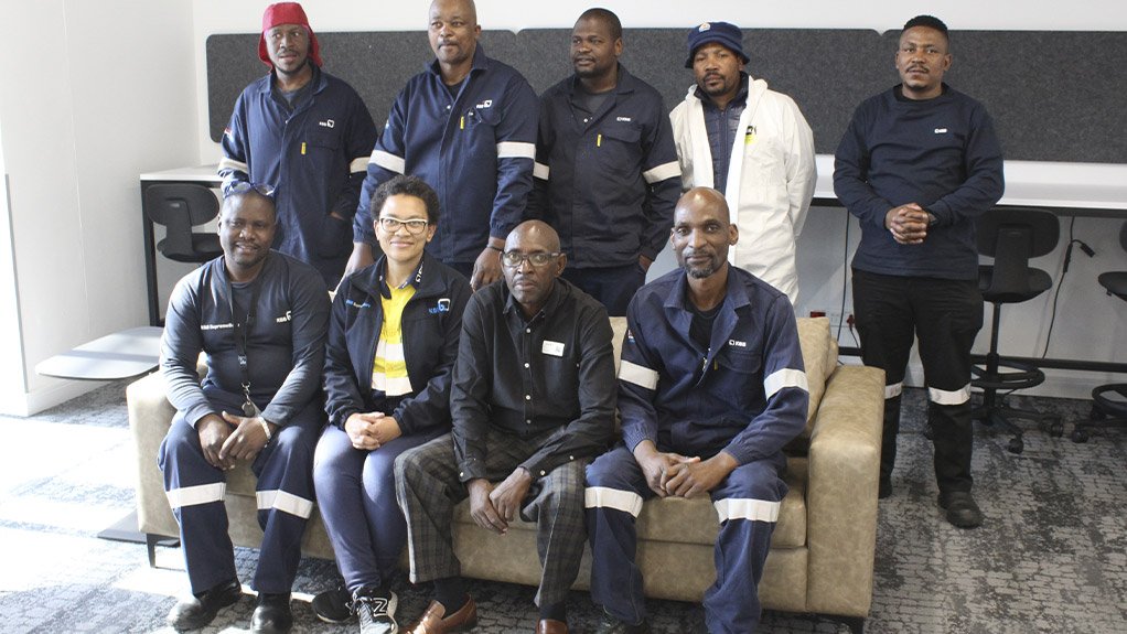 Nicola Ntshavheni, KSB’s Skills Development Facilitator, and Ashbey Moyo, a longstanding Triple E Training Facilitator, as well as the five KSB Group employees who will complete their final adult education and training in literacy and numeracy