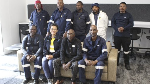 Nicola Ntshavheni, KSB’s Skills Development Facilitator, and Ashbey Moyo, a longstanding Triple E Training Facilitator, as well as the five KSB Group employees who will complete their final adult education and training in literacy and numeracy