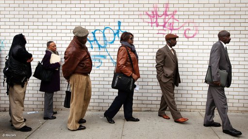 people waiting in line for employment