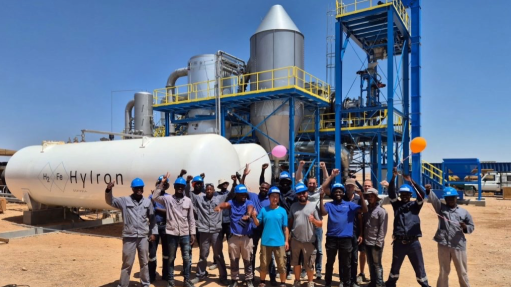 An image of Hylron team members and stakeholders at the Hylron plant