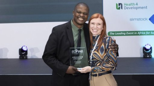 SAPICS director Jonathan Mphake and Deborah Dull (winner of The Most Innovative Presentation award)