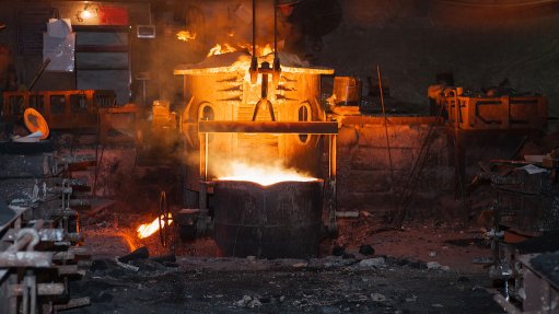 Cauldron with molten metal