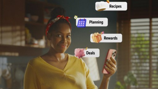 Image of a woman holding a mobile phone 