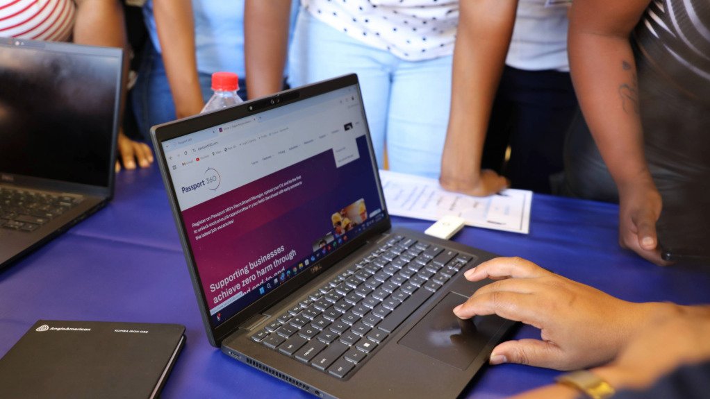The above image depicts a laptop open to the Passport 360 recruitment platform