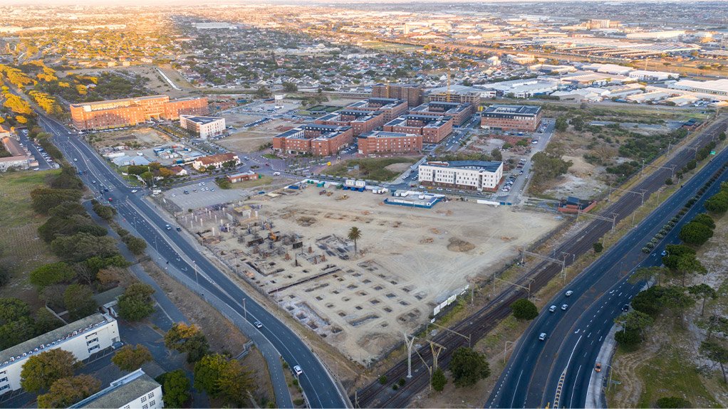 An aerial view taken in February 2025 shows construction progressing on The Pines retail centre, a key mixed-use component within the Conradie Park development.