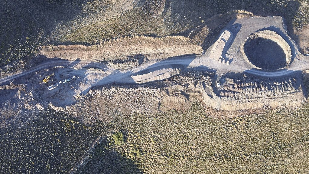 An aerial view captures on-site crushing In operation near one of the wind turbine base excavations at Karreebosch Wind Farm