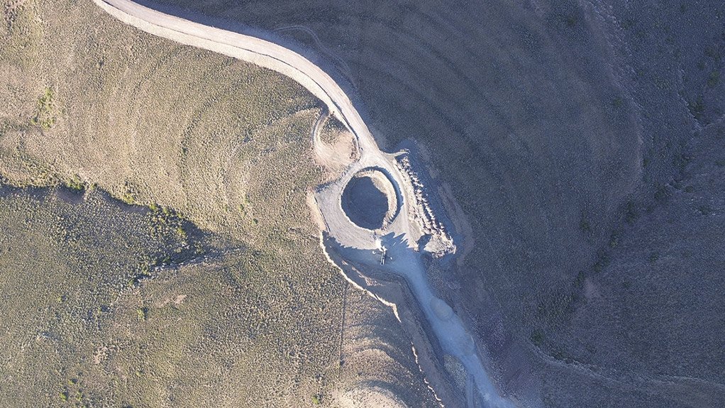 An aerial image showing cut-to-fill earthworks in progress alongside the excavation of a wind turbine base at Karreebosch Wind Farm