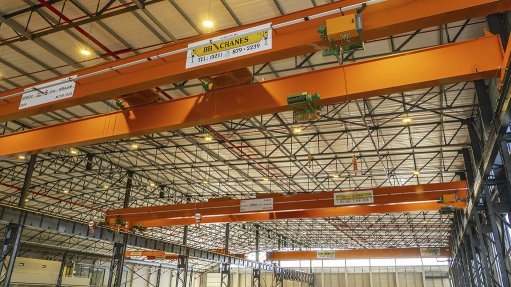 Image of overhead cranes in a manufacturing Facility