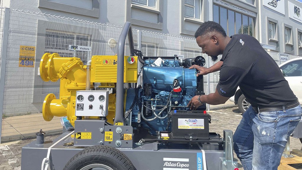 Image of an IPR technician servicing a dewatering pump