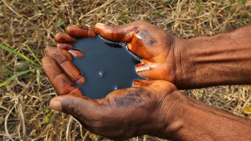 oil in hand