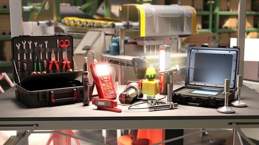 Image of a laptop on an industrial workbench