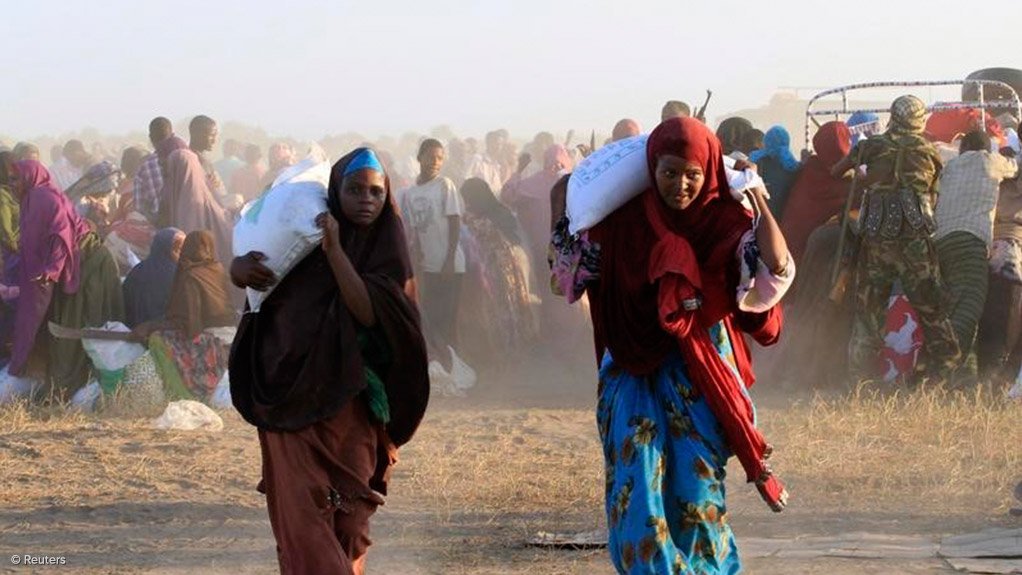 People collecting food aid