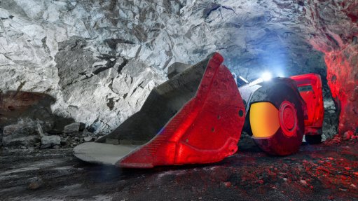 a large underground machine with a cross section of its tyre showing the yellow TyrFil compound in it