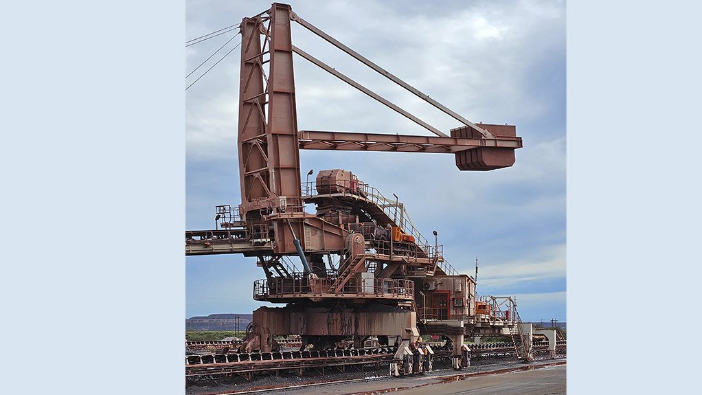 This reclaimer chute at an iron ore mine shows how Weba Chute Systems controls material flow, reduces dust and protects downstream equipment in high-volume operations