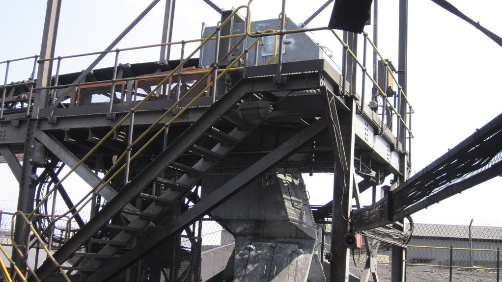 At this conveyor-to-conveyor transfer point custom Weba chutes keep material flowing smoothly while reducing spillage and belt wear, thanks to years of experience and advanced flow simulation