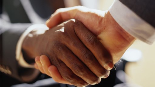 two men shaking hands