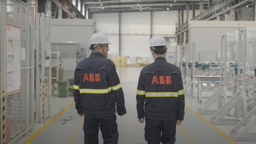 The above image depicts two ABB technicians walking through a facility