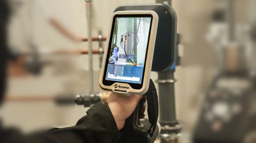 A technician uses an acoustic camera 