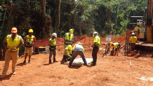 Mine workers on site conducting exploration processes