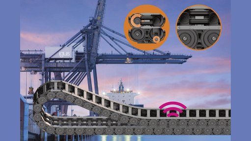 Image of igus e-chain cable carriers with cranes in background