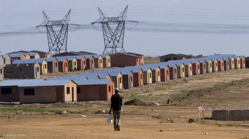 Houses with powerlines in the background