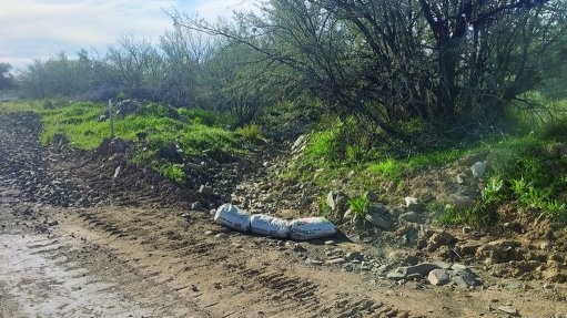 The above image depicts sand bags, used to block run off from the construction site