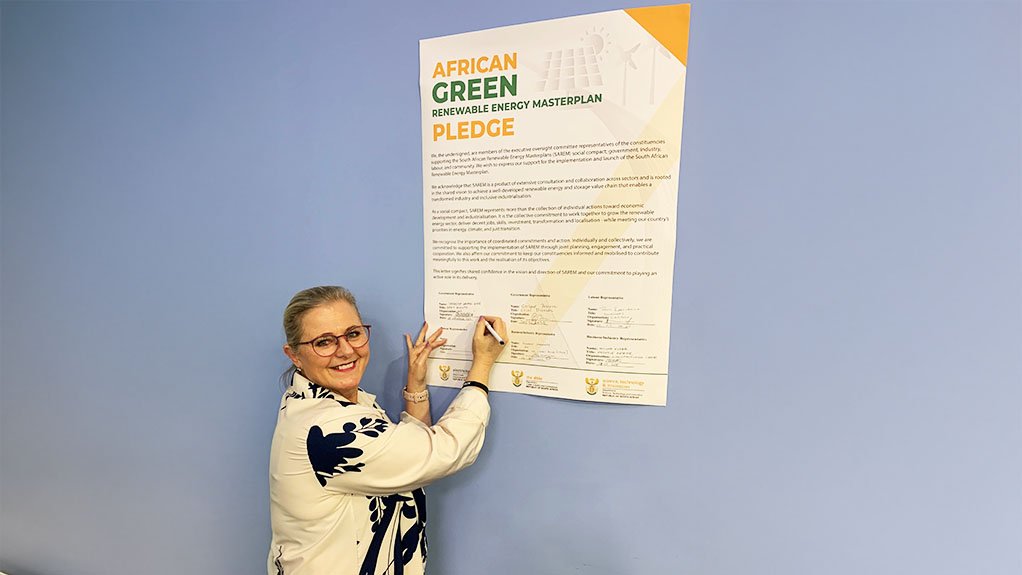 Electricity and Energy Deputy Minister Samantha Graham-Maré signing the pledge