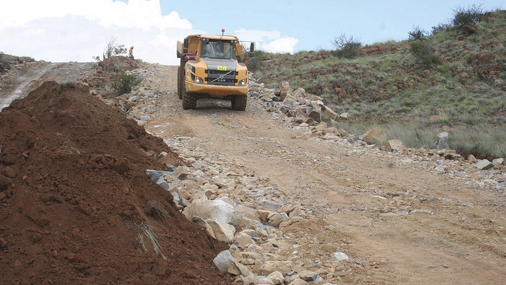 Load and haul activities underway on the De Aar 2 South Wind Energy Facility project, supporting bulk earthworks for roadbeds and turbine platform development