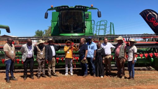 MEC cuts the ribbon along with stakeholders to unveil new farming equipment