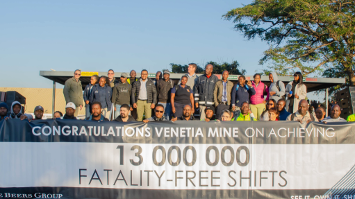 An image of Venetia mine personnel celebrating the 13-millionth fatality-free shift