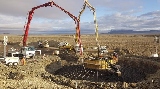 Image of concrete being poured for wind farm foundations