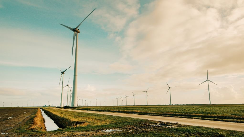 Wind turbines on a field generating electricity