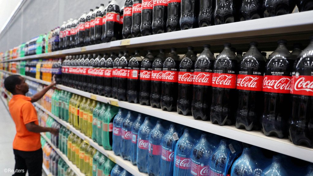 Bottles of Coca-Cola on a shelf