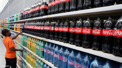 Bottles of Coca-Cola on a shelf