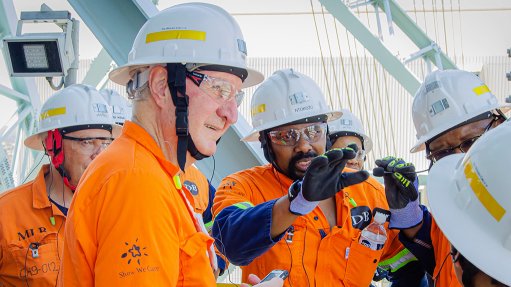 Venetia Senior GM Ntokozo Ngema pointing out impressive Venetia infrastructure to Mining Weekly’s Martin Creamer.